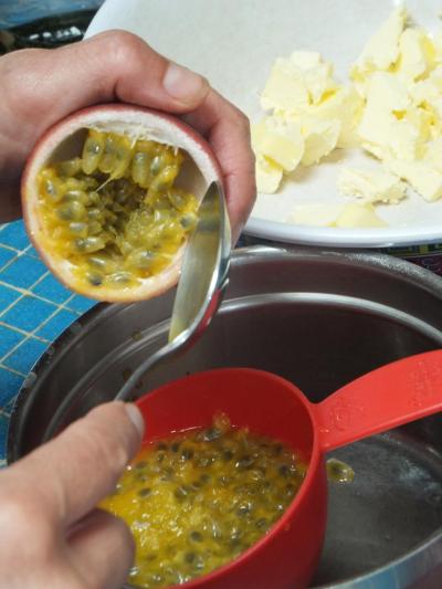 spooning passionfruit pulp