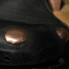 finished rivets curve to match saddle contour